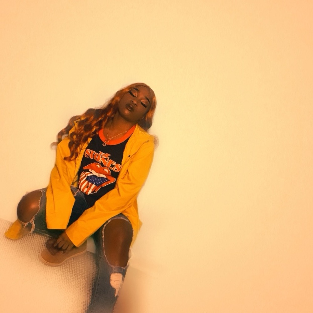 “DONT EVEN TRY IT” mustard yellow jacket.
